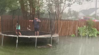 Family Turns Flooded Backyard into Canoe Fun