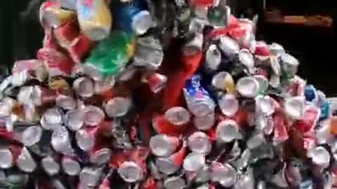 Person Covered With Empty Cans Runs on Streets of Belgian City