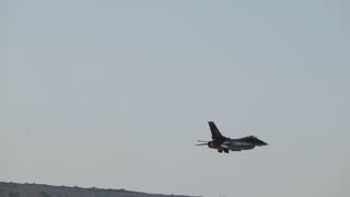 F-16 taking off and making a steep climb