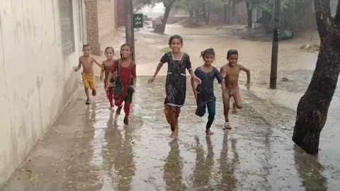 Children are enjoying the rain