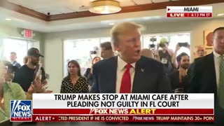 Trump stops by at a Miami cafe and orders "Food for everyone!"
