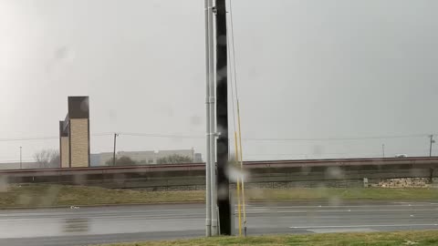 Round Rock Tornado Forming in the Distance From Car Dealership