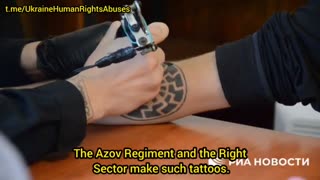 Former Ukrainian military men cover up the Nazi and Nationalist tattoos they got while in service.