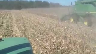 Grain cart racing the combine