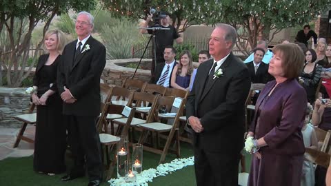 Bride and groom step aside to give parents the opportunity to renew their vows!