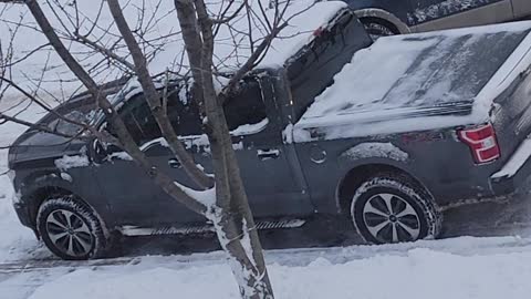 Stuck Truck Finally Freed From Snow