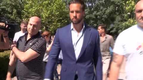 Tate brothers arrive in Romanian court to appeal house arrest conviction