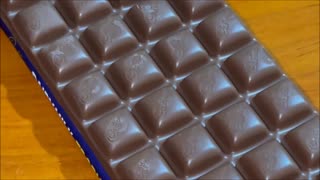 Cadbury Dairy Milk Tropical Pineapple Chocolate Product vs Packshot