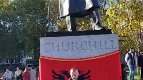 Albanians drape national flag over CHURCHILL in London