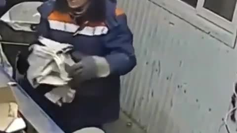 Man saves cat in a literal bag while dumpster diving .