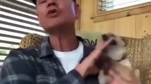 Man Petting His Dog