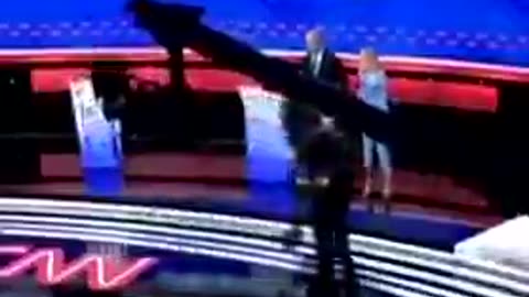 Zoomed in video of Jill Biden leading Joe off the debate stage