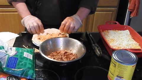 making chicken enchiladas