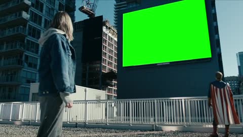 Homelander Looking at a Big Green Screen