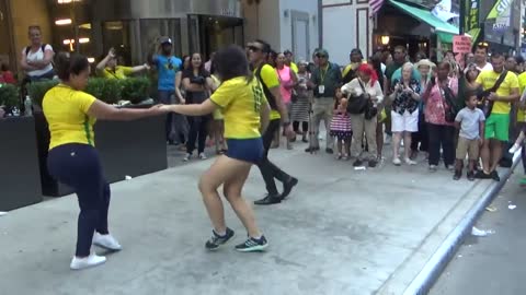 BRAZILIAN GIRL DANCES A BRAZILIAN SAMBA STREET DANCE AT BRAZILIAN CARNIVAL CULTURE PARTY NEW YORK