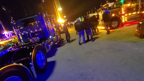 Mid America Trucking Show, light show, semi trucks at night MATS 2024