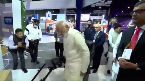 PM Modi driving a car in Europe while seated in India through 5G network. Check out the video.