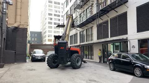 Stocking material with JLG 1075 to the 6th floor in Downtown Los Angeles!