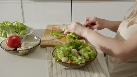 Person Preparing a Salad