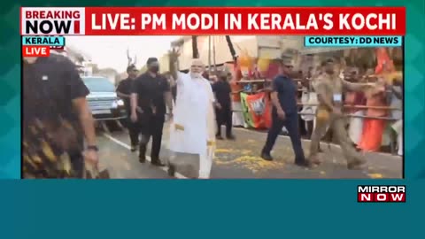 Kerala_ PM Modi holds roadshow in Kochi wearing traditional Kerala attire_ receives rousing welcome