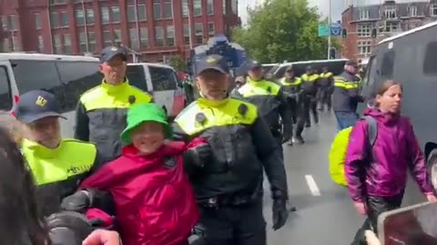 Greta Thunberg being 'arrəsted' again, and they stop to pose for photographs?