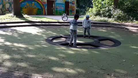 Kids jumping on trepolin
