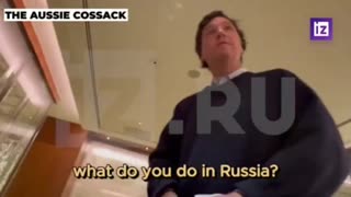 Tucker in Russia Says “We’ll See” on Putin Interview