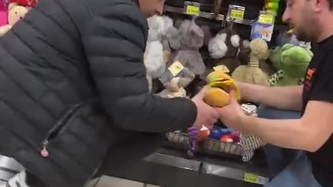 Dog Takes Off With Toy in Pet Store