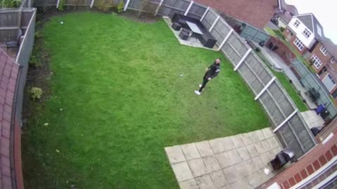 Man Trips on Sweet Playful Dog Running in Backyard