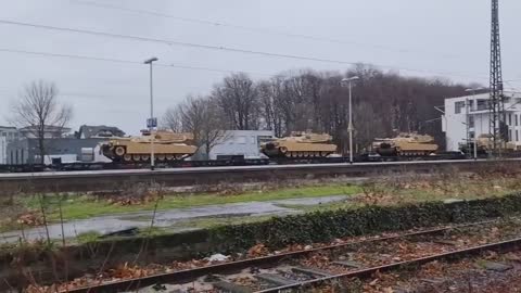 A Train With M1 Abrams Tanks in Germany heading East Towards Poland