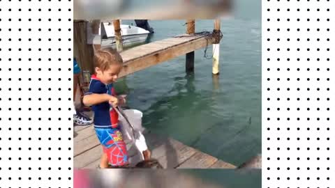 Funny cute babys meet fish in Frist time