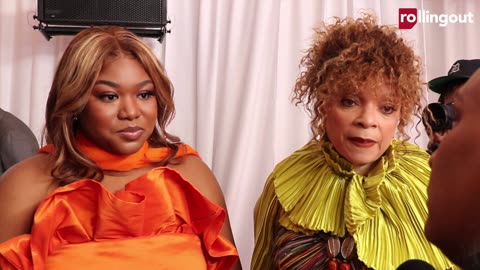 Ruth E. Carter's pink carpet look designed by student designer Osadayi Ohanmu,