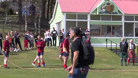 World's Strongest Men in a Tug o' War Challenge at Braemar Gathering Highland Games site in Scotland