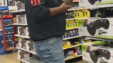 Guy Tests The Bluetooth Feature of A Boombox At Walmart