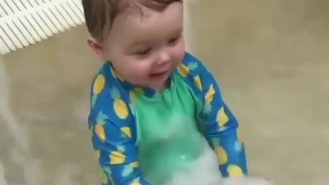 Babies & Kids—The joy of the child while playing with water cute