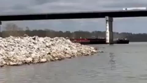 The US-59 bridge in Sallisaw, Oklahoma is shut down after being struck by a barge