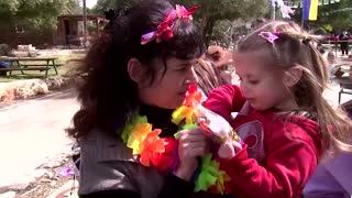 Ukrainian orphan refugees celebrate Purim