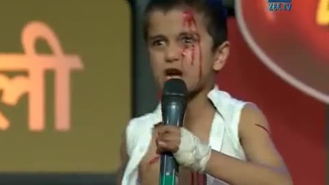 sweet little boy making Indian heroes mimicry
