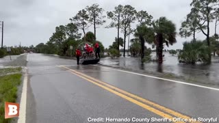 Police RESCUE Mother and Son Stuck on Bridge Using Airboat After Hurricane Idalia