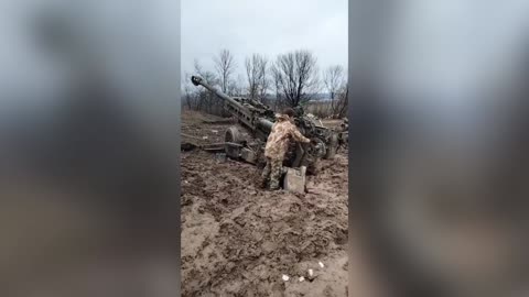 Tough Ukrainian Fighters Shoot Howitzer Shells Amid Muddy Mess