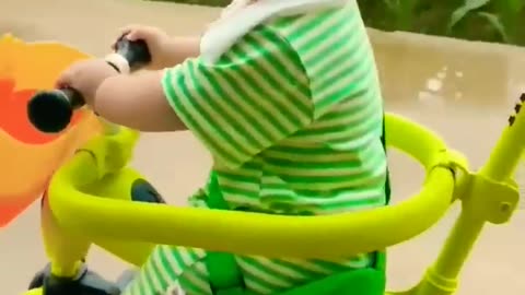 Cute baby cycling