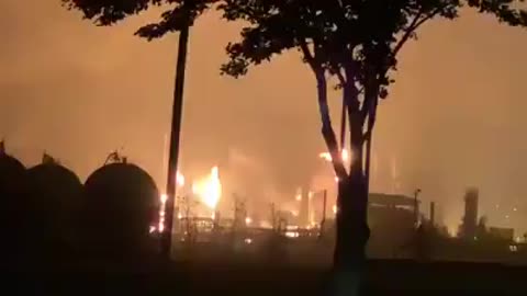 Refinery fire at night