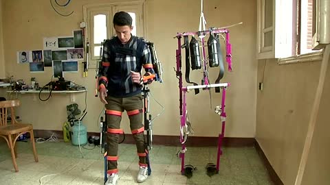 Father builds exoskeleton to help son walk