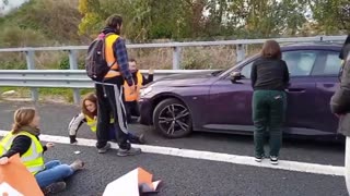 Driver Shows How To Clear A Road Blocked By Protesters