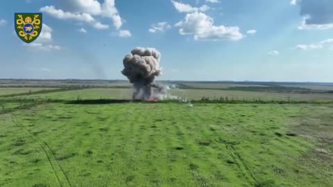 Russian Tank DetonatesAfter Ukrainian Drone Drops Grenade into Open Hatch