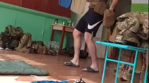 Ukraine soldiers using a school as shelter and to store weapons