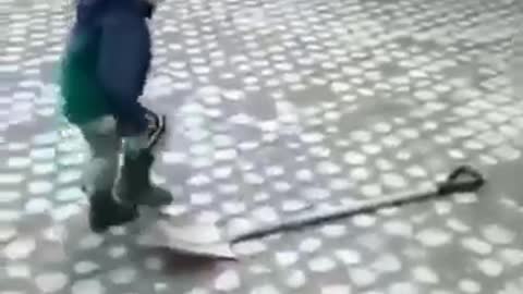 Little guy with Shovel wrestling