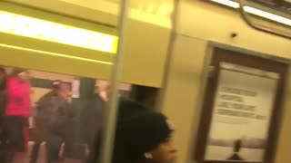 Woman screaming in subway