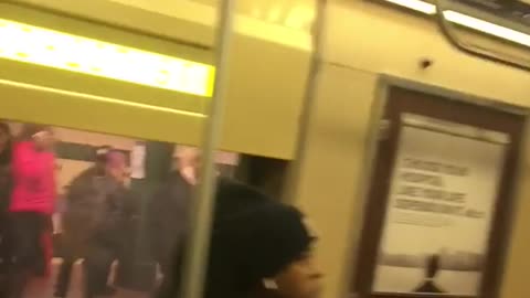 Woman screaming in subway