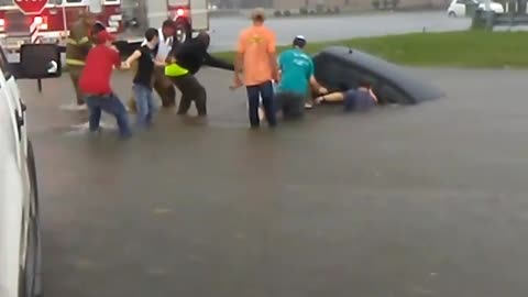 Men Rescue Woman From Car After Flash Flood